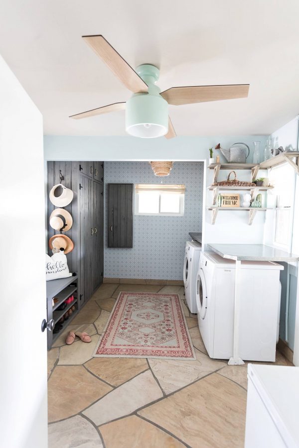 100 Fabulous Laundry Room Decor Ideas You Can Copy - You have to see this decor idea with stone-collage flooring and an arrabic carpet. Love it!