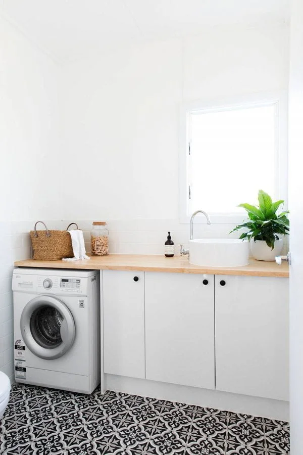 100 Fabulous Laundry Room Decor Ideas You Can Copy - You have to see this decor idea with simplified cabinet arrangement and wood countertops. Love it!