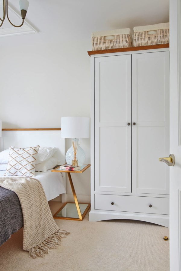  decor idea with white nightlamp and top-of-the-closet storage baskets. Love it!   