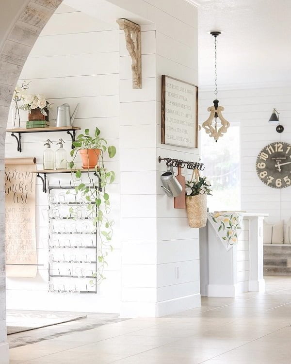  decor idea with chain-hanging ceiling lamp and white smooth floors. Love it!   