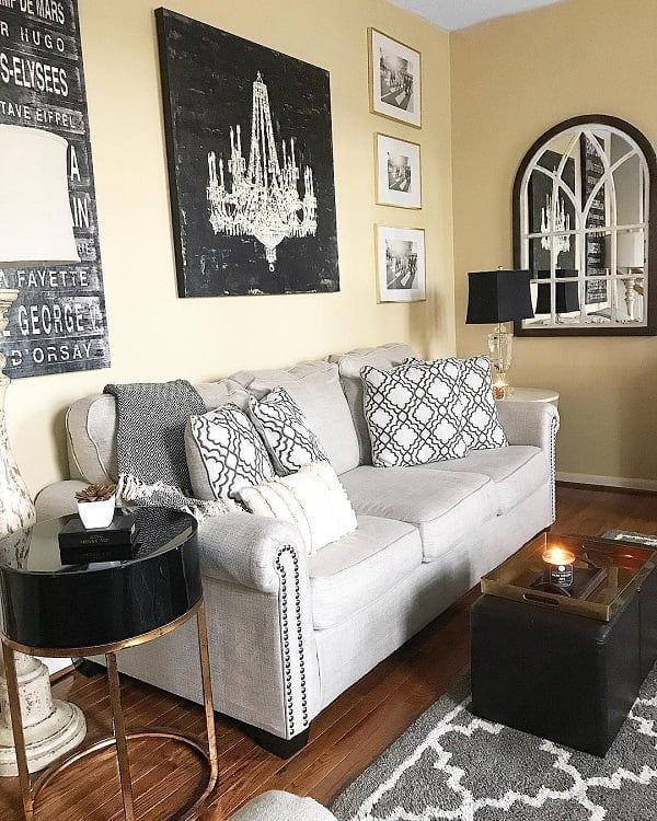  decor idea with ottoman coffee table and expensive-looking nightstand. Love it!   