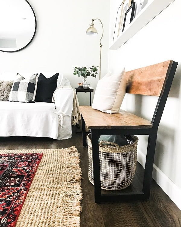  decor idea with handmade red rug and impactful black-frame mirror. Love it!   