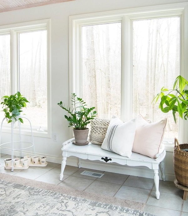  decor idea with tall metalic flower holder and ivory tile floors. Love it!   