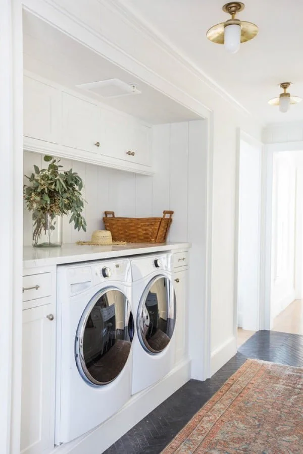 100 Fabulous Laundry Room Decor Ideas You Can Copy - You have to see this laundry room decor idea with white cabinets and marble countertops. Love it!