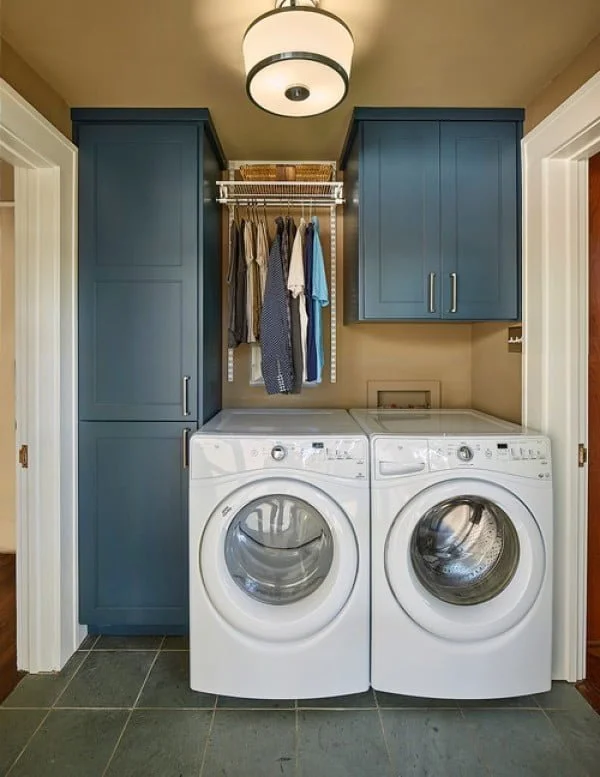 100 Fabulous Laundry Room Decor Ideas You Can Copy - You have to see this laundry room decor idea with navy blue cabinets. Love it!