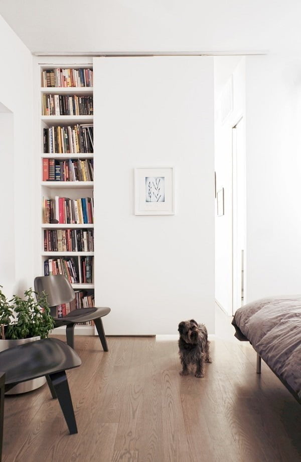 You have to see this  decor idea with white shelves and minimalistic reading chair. Love it!  