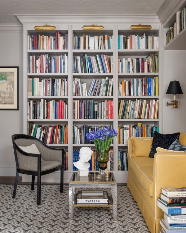 You have to see this  decor idea with detached and extra ceiling book shelf and triple gold lights. Love it!  