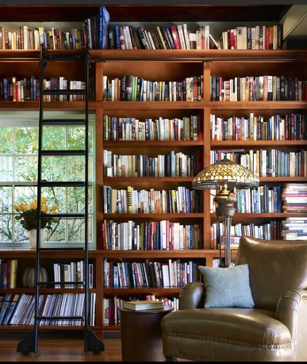 You have to see this  decor idea with window-wrapped shelves and a traditional wood bookshelf ladder. Love it!  