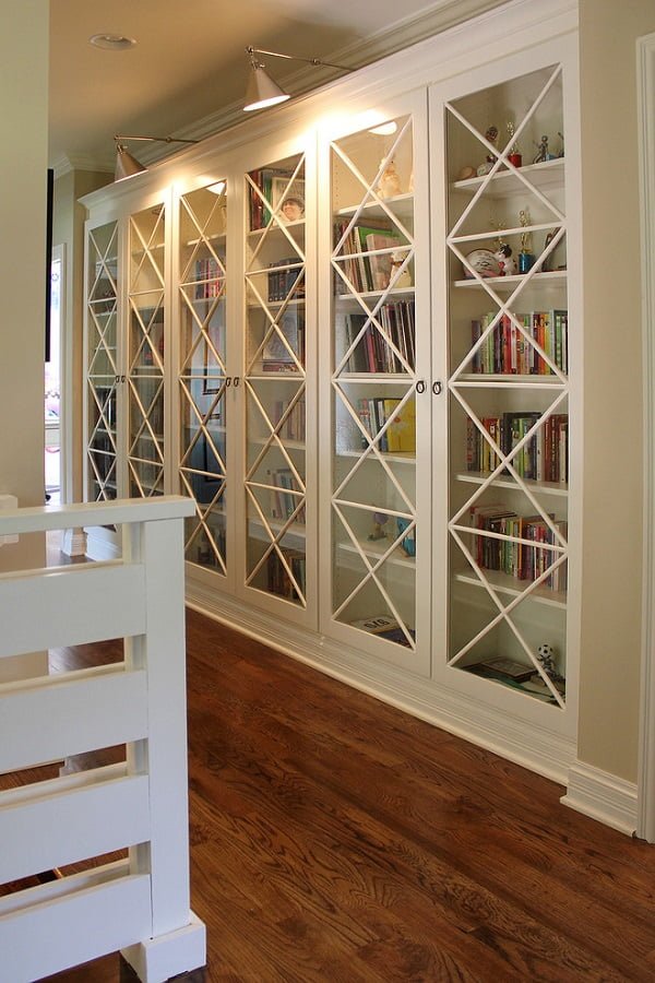 You have to see this  decor idea with high hardwood shelves and multiple double glassdoors. Love it!  