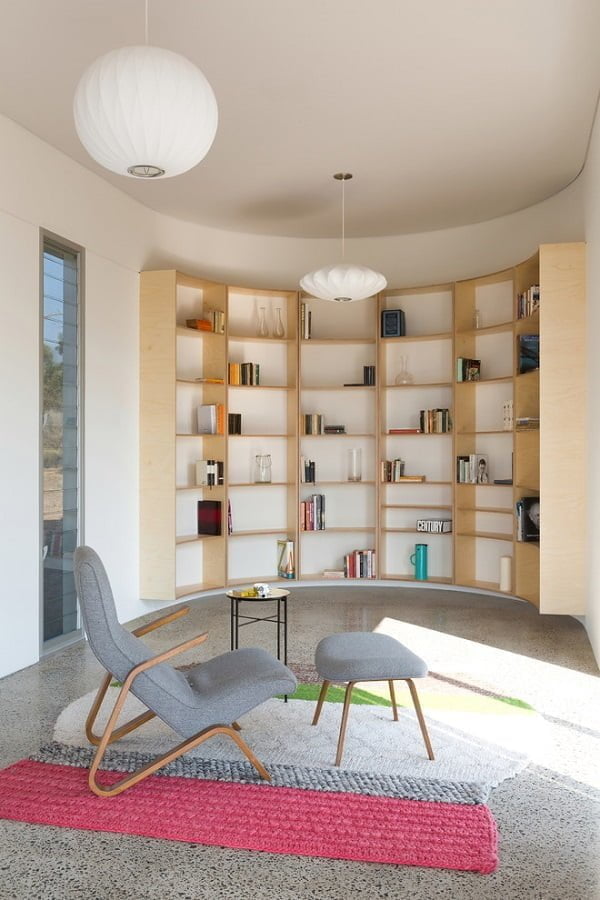 You have to see this  decor idea with open library and a great sitting area. Love it!  