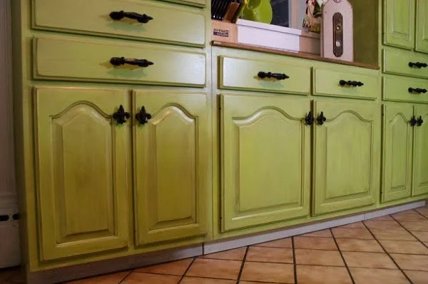 Painted green rustic kitchen cabinets 