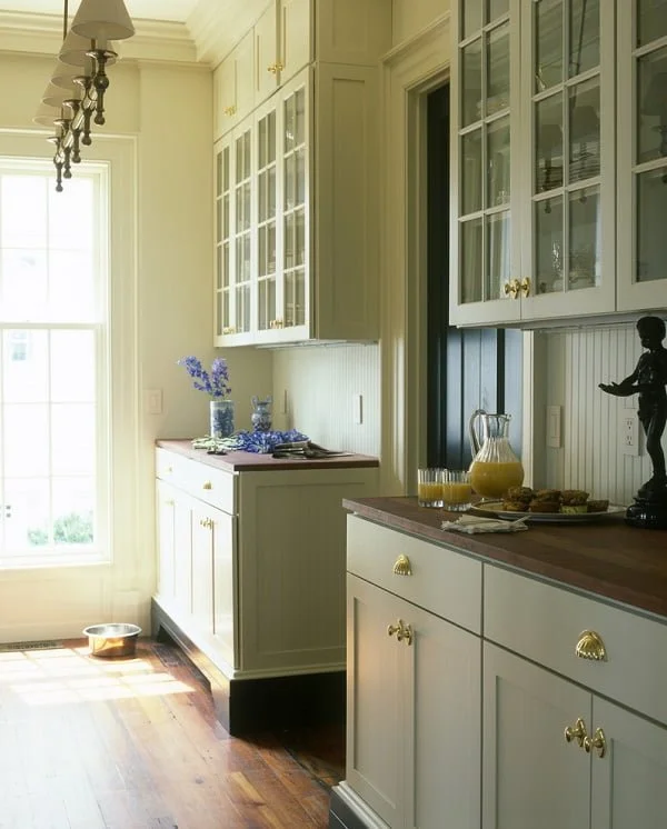 Subtle soft green kitchen cabinets