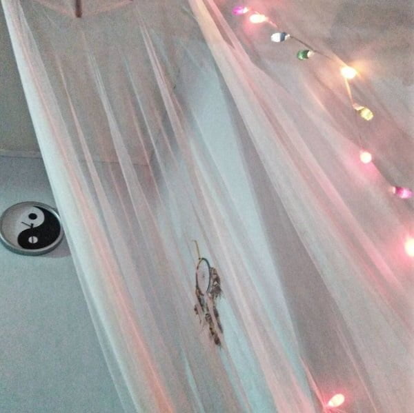 Teen bedroom bed curtain idea