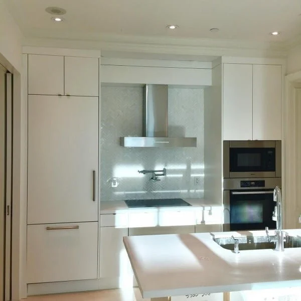 Small Kitchen with White Cabinets 