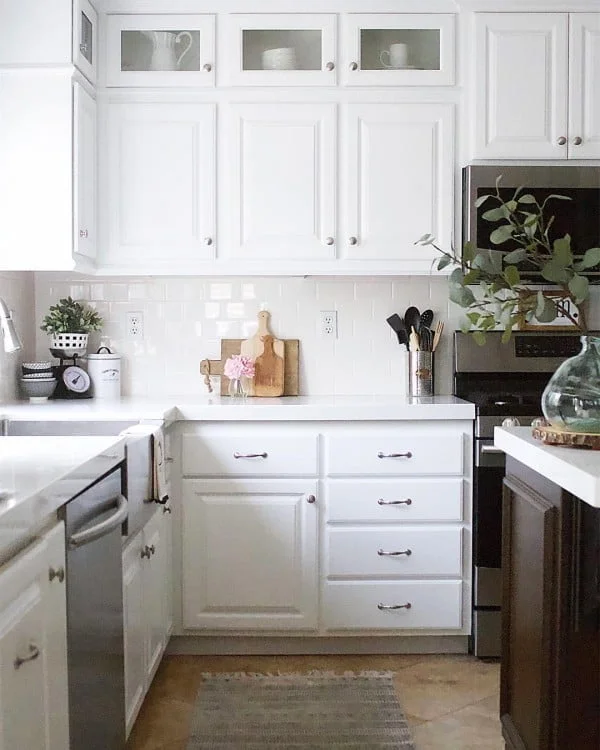 White Kitchen Cabinets with Subway Tile Backsplash 