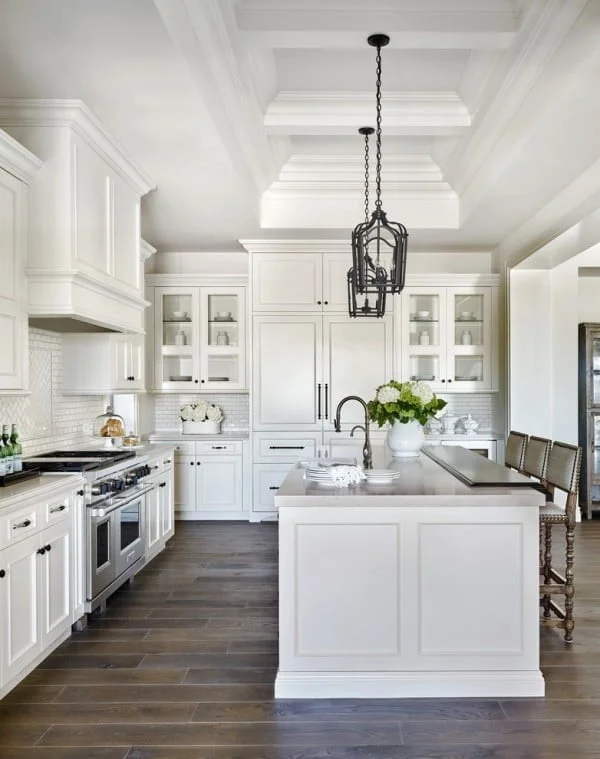 Modern Farmhouse Kitchen with White Cabinets and Dark Wood Floor 