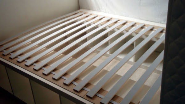 Use Vertical Shelving Units for a Storage-Friendly Bedframe #diy #homedecor #bedroomdecor #storage