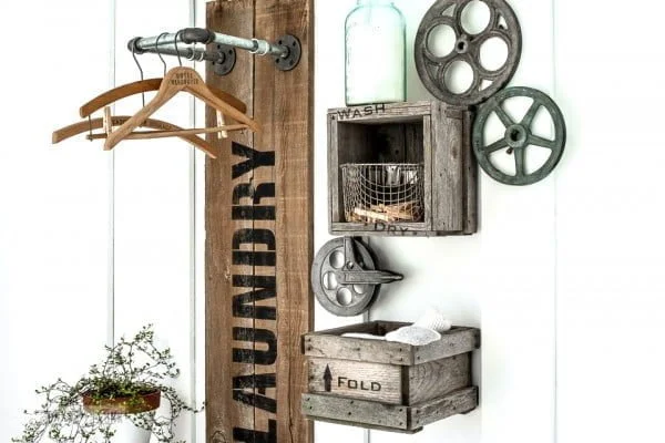 reclaimed pipe laundry sign hanging station 