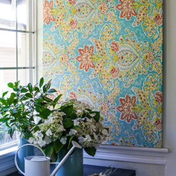 Make Easy DIY Art with a Canvas Stretcher Frame and Pretty Fabric