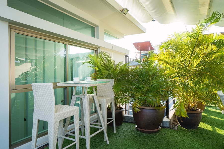 apartment patio with potted plants