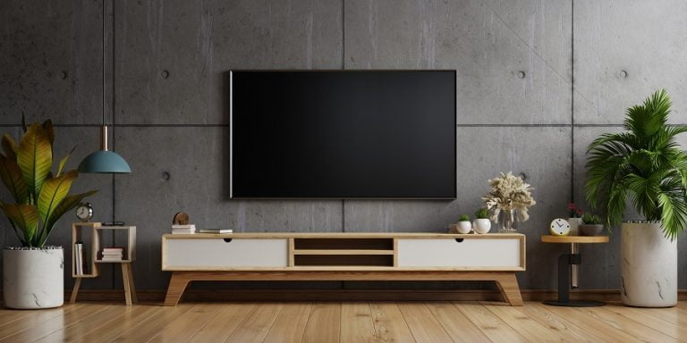 What to Put Under the TV on the Wall? [12 Ideas]