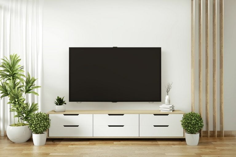 What to Put Under the TV on the Wall? [12 Ideas]