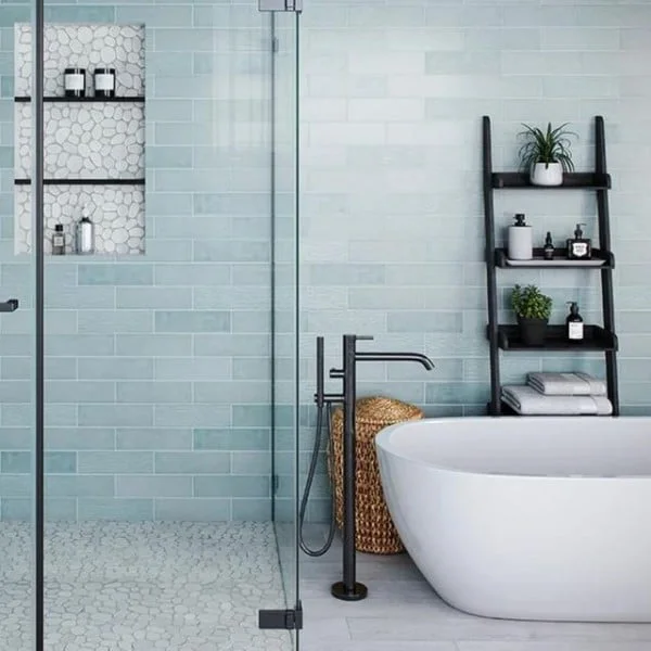 Island Stone on Instagram: "Our Nomad Ceramic Tile collection blends texture, color, and tonal effects which creates stunning, visual movement in the tiles. With a crystalline translucent finish, it features a natural blend of hues and depth. Available in six colors, Nomad is perfect for your next bathroom or kitchen renovation. bathroom wall tile