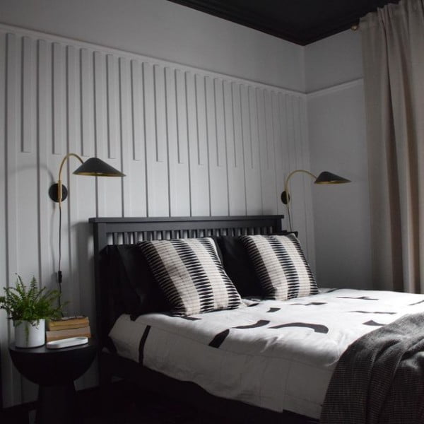 Panelling Reveal bedroom with black furniture
