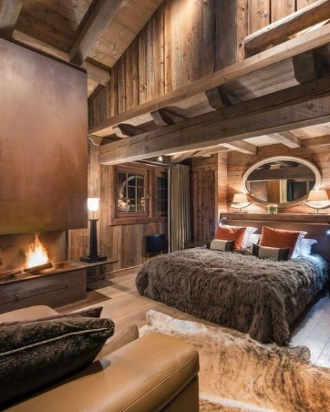 Luxury Chalets Collection bedroom with fireplace