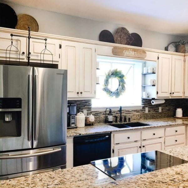 Baskets decor above kitchen cabinet