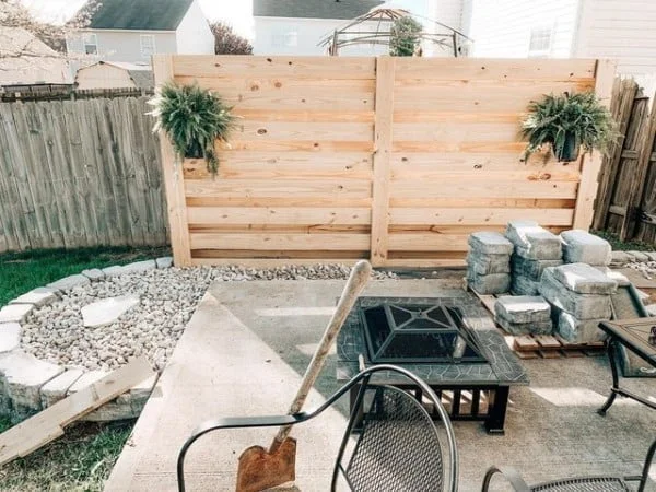 Wooden Privacy Fence with Greenery Accents privacy fence