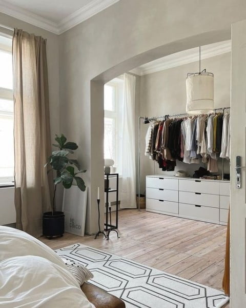 Stylish Walk-in Closet by Gruenderzeit Zeit bedroom with walk in closet