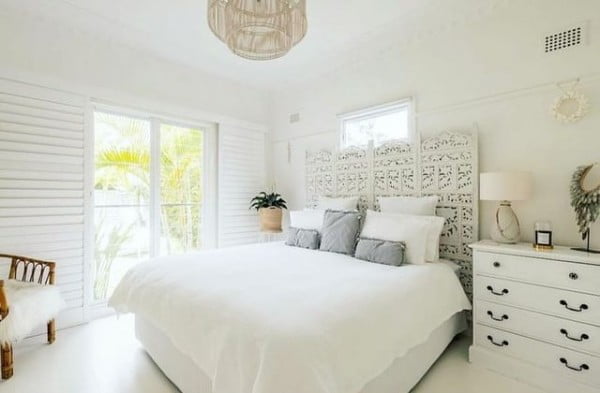 Dreamy Holiday House bedroom with white furniture