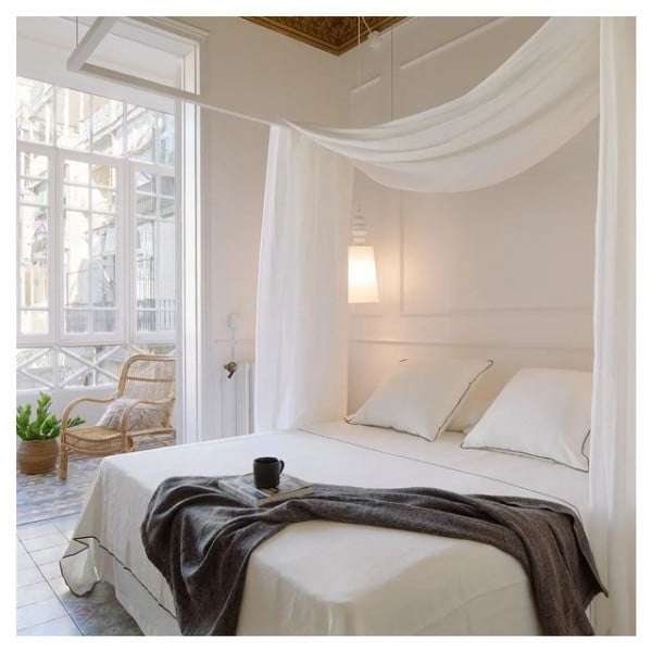 Barcelona Apartment bedroom with canopy bed