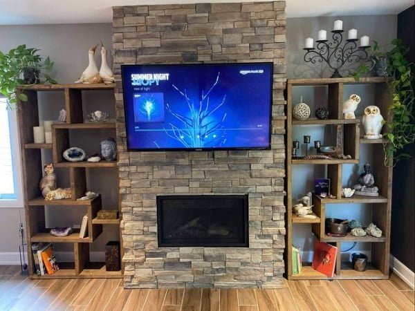 Mirrored Shelf Units with TV mantel decor with tv