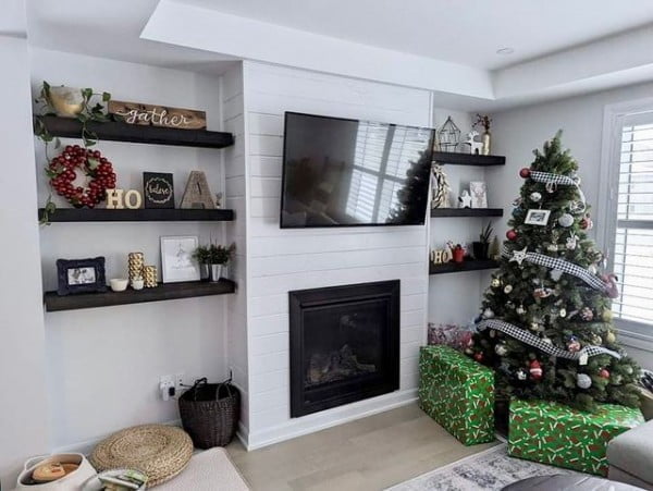 Dark Shelves with Christmas Decorations mantel decor with tv