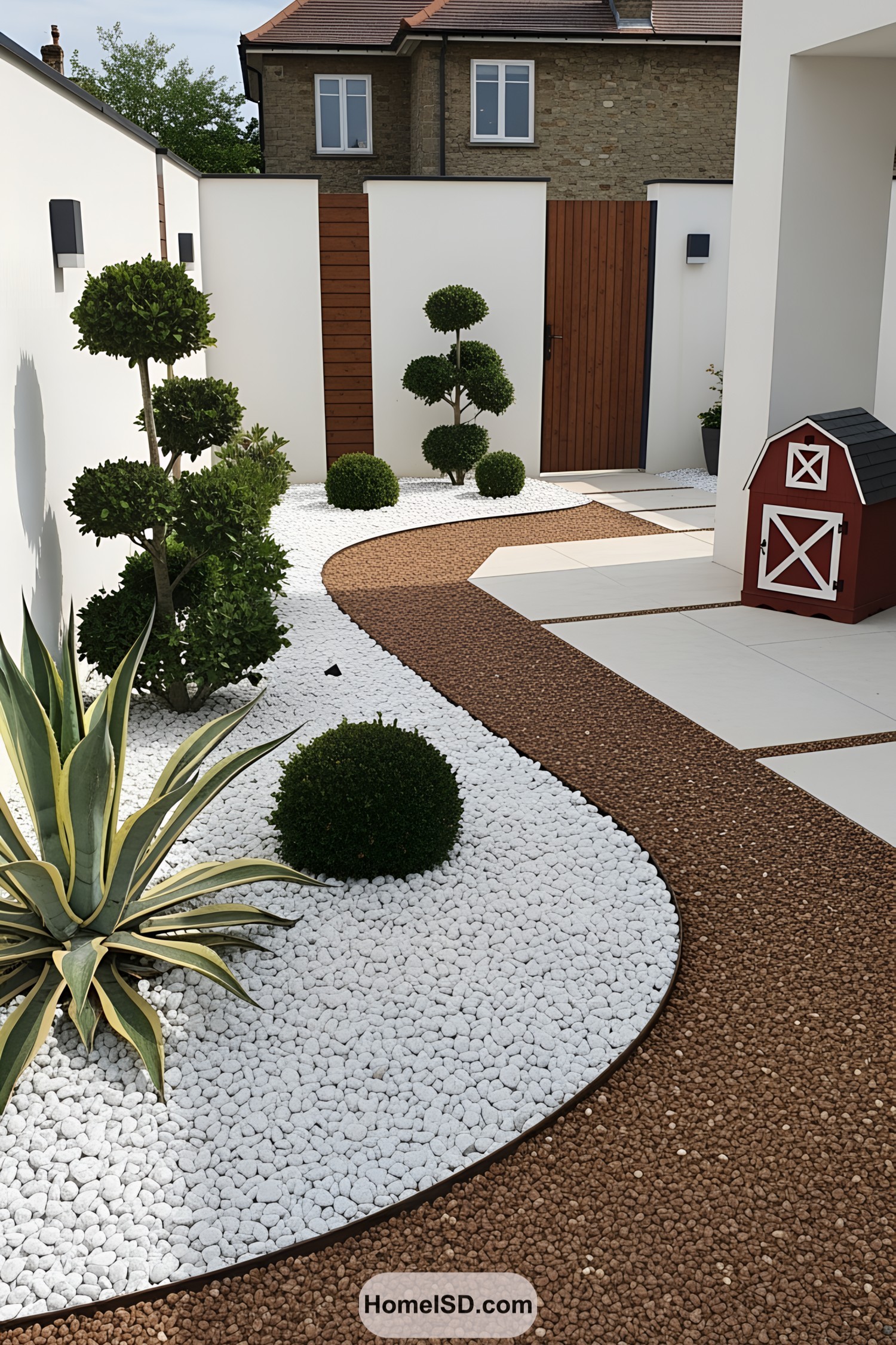 Stylish garden with white stone pathways and lush greenery