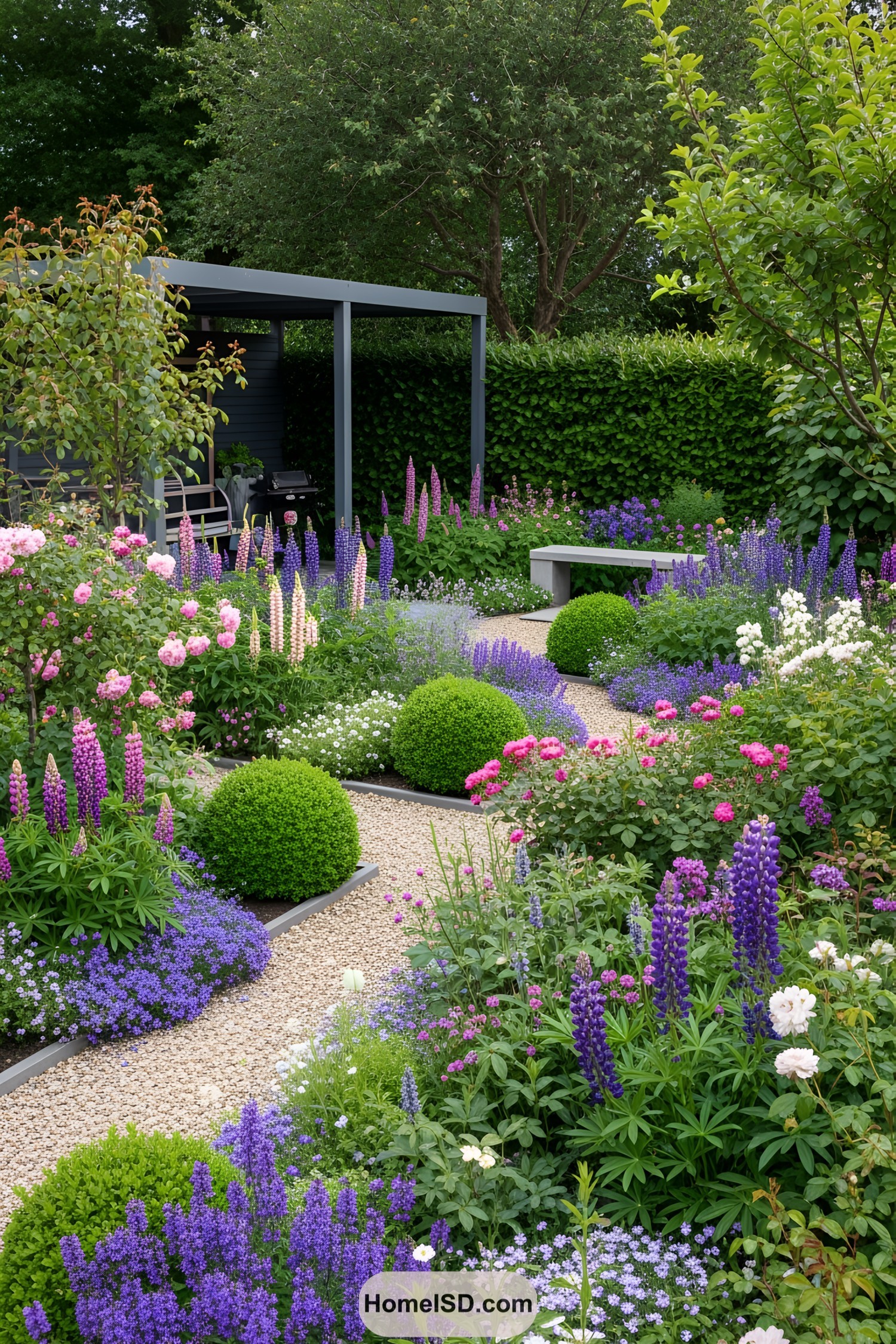 Cottage garden with vibrant flowers and a charming pathway