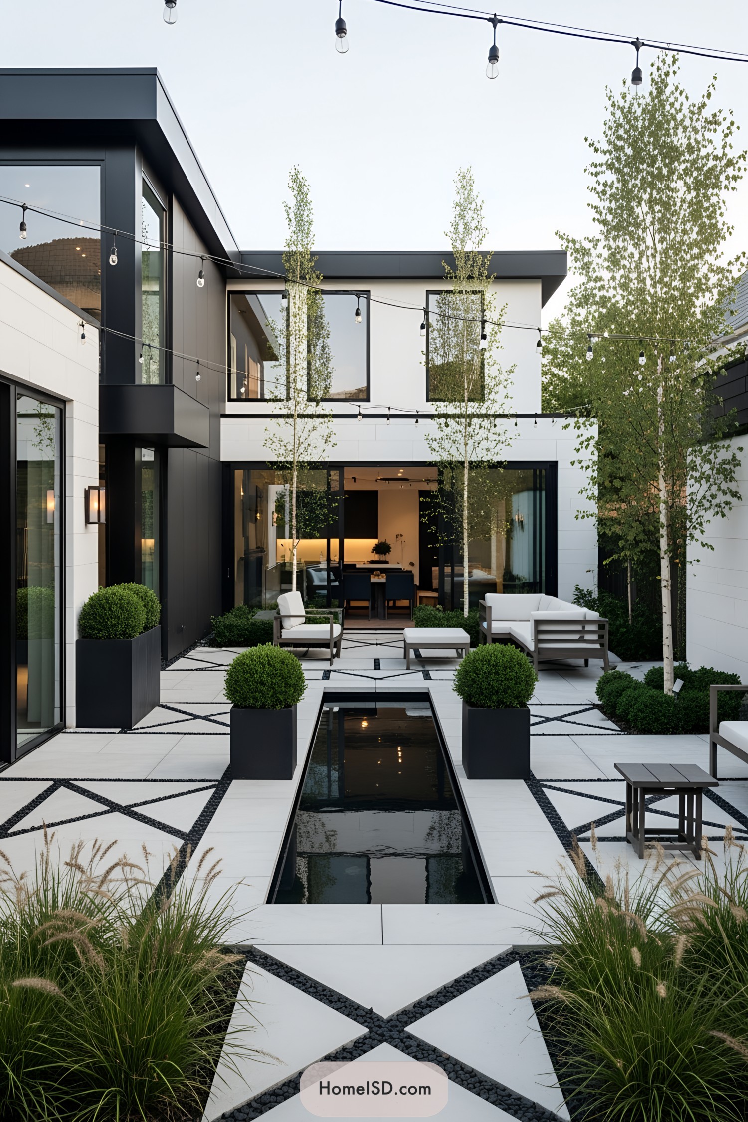 Contemporary patio with geometric design and cozy seating