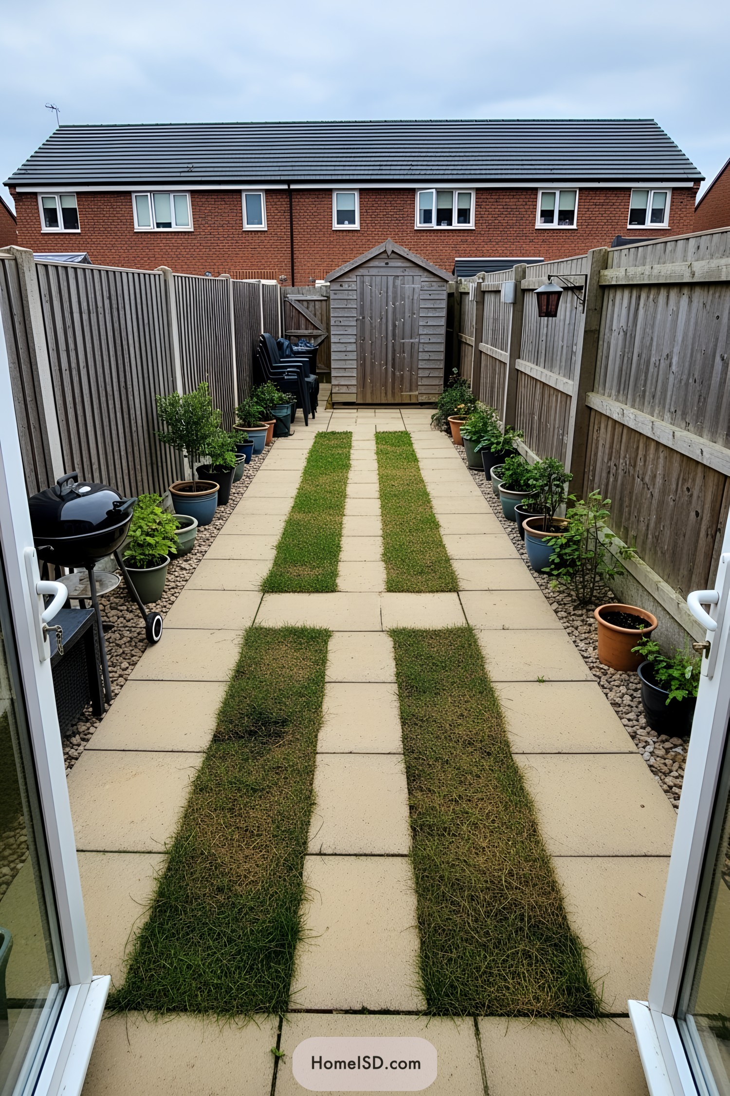 Narrow garden pathway with plants