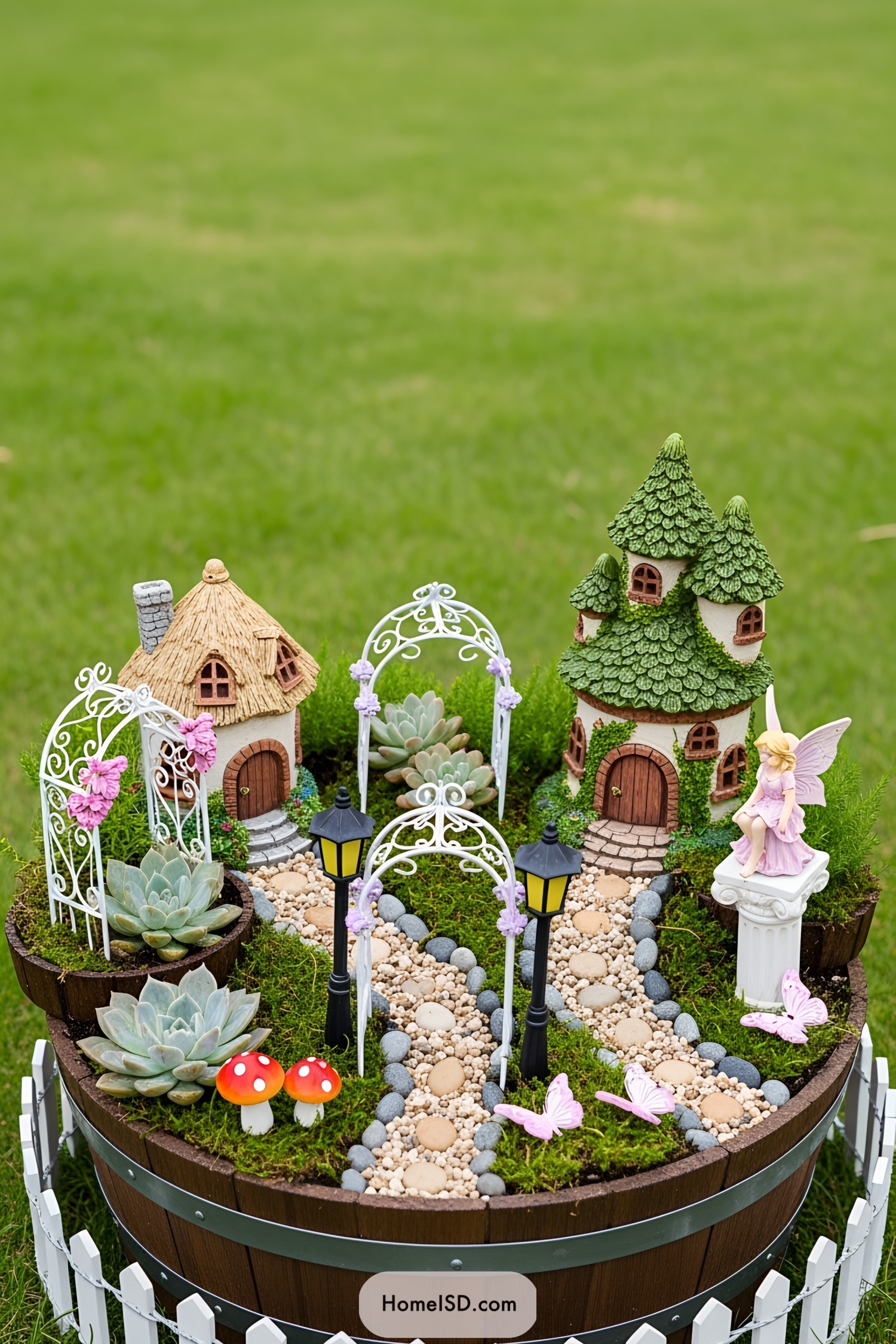 Miniature dwellings with lush greenery and fairy figure in a garden setting