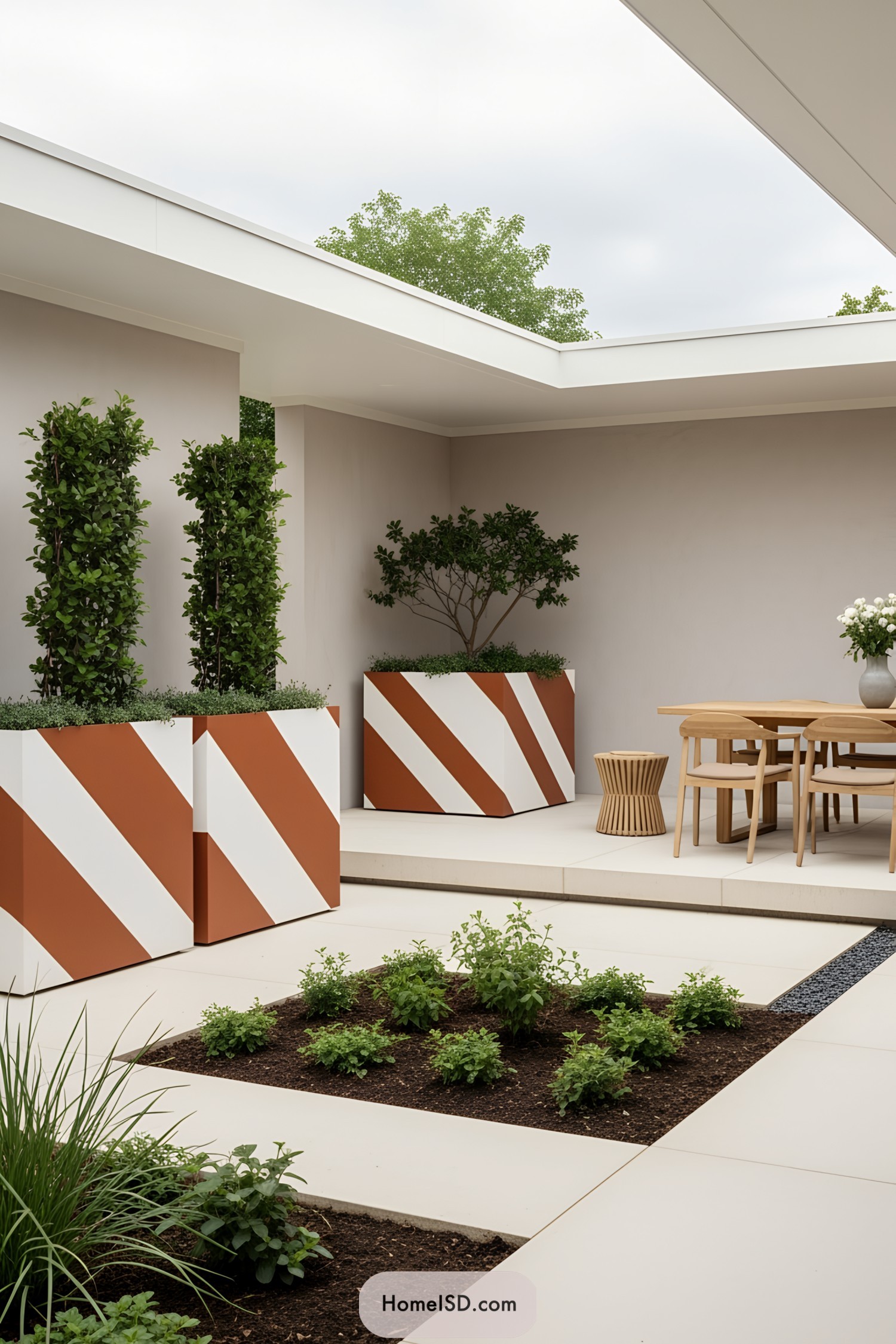 Stylish geometric planters in a modern courtyard