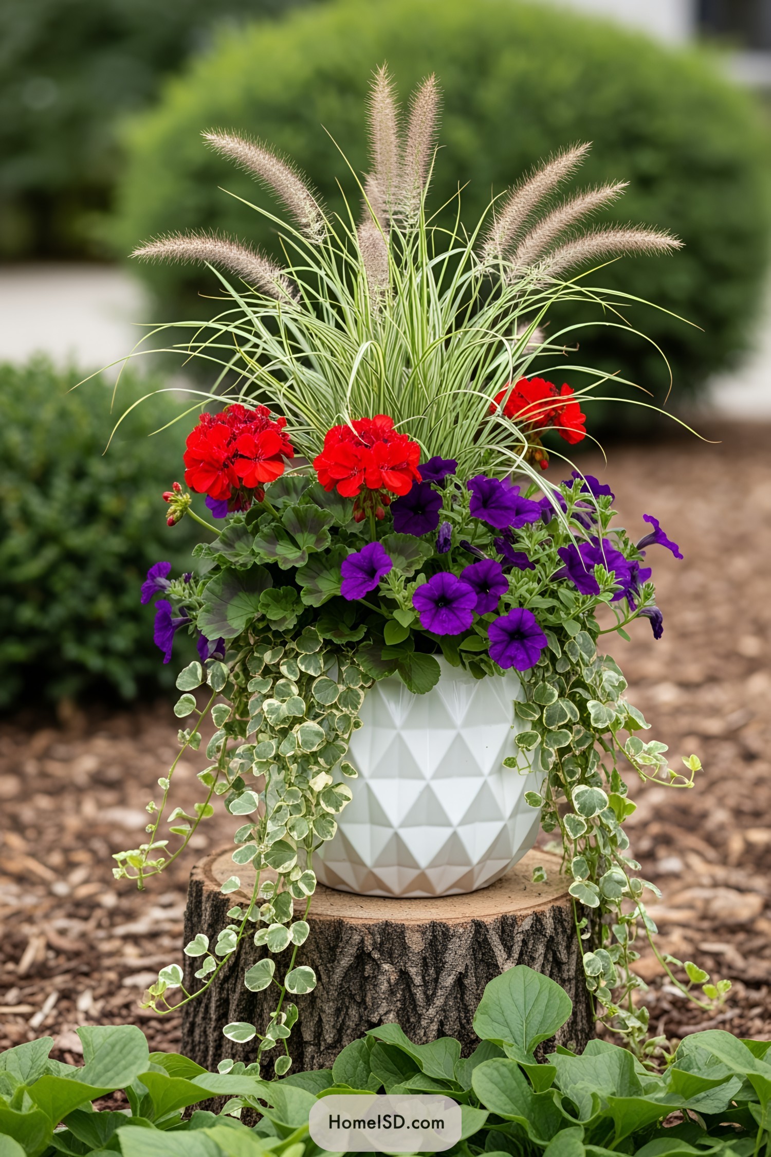 White pot with vibrant flowers on a tree stump