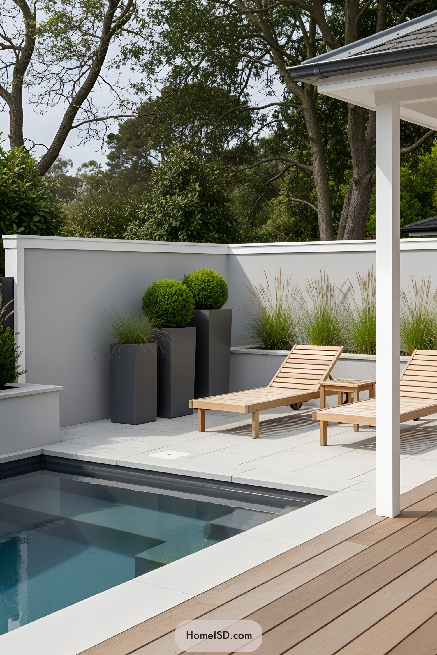 Small pool design with lounge chairs