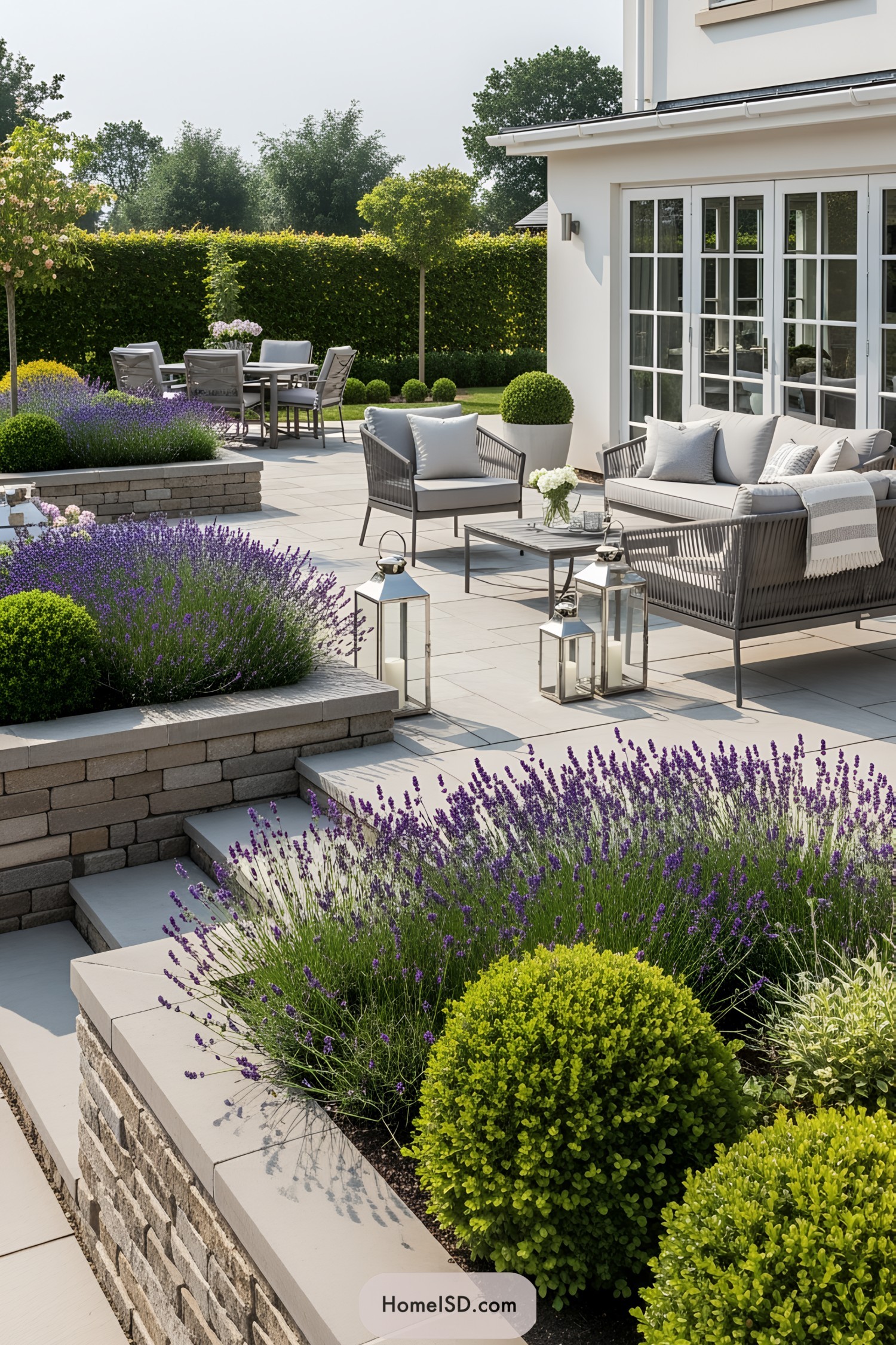 Stylish patio with layered plantings and seating