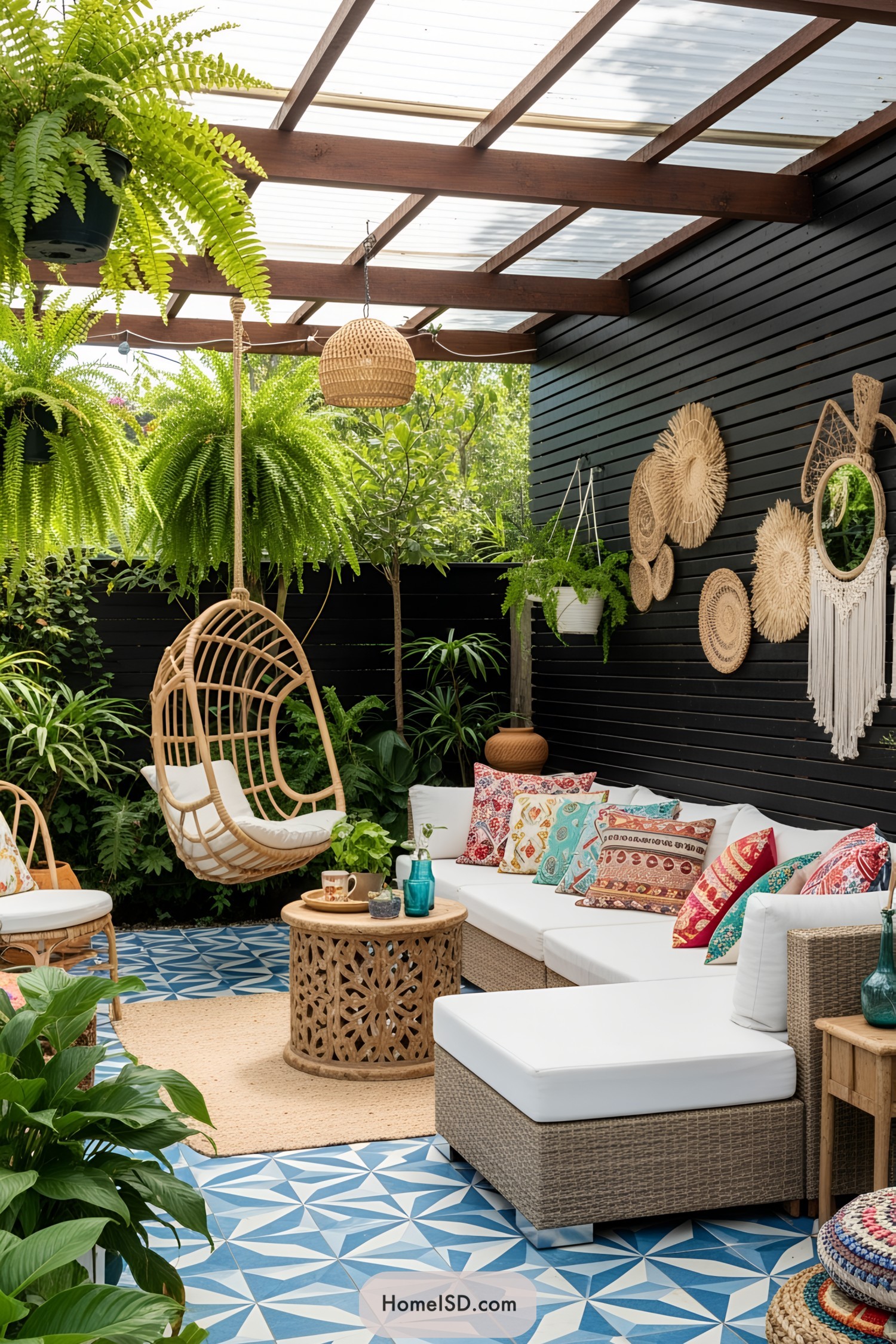 Cozy boho patio with colorful cushions and hanging chair