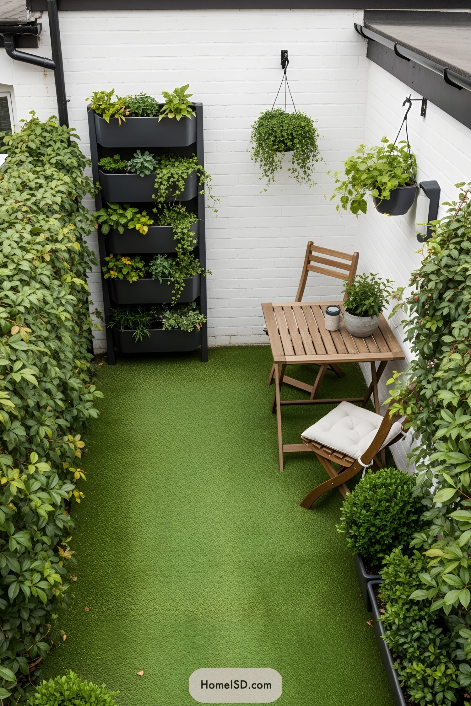 Small patio with vertical garden and cozy seating