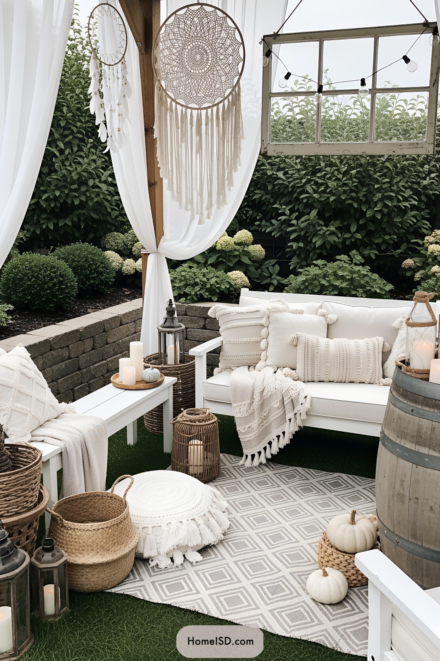 Cozy patio with wicker accents and white drapery