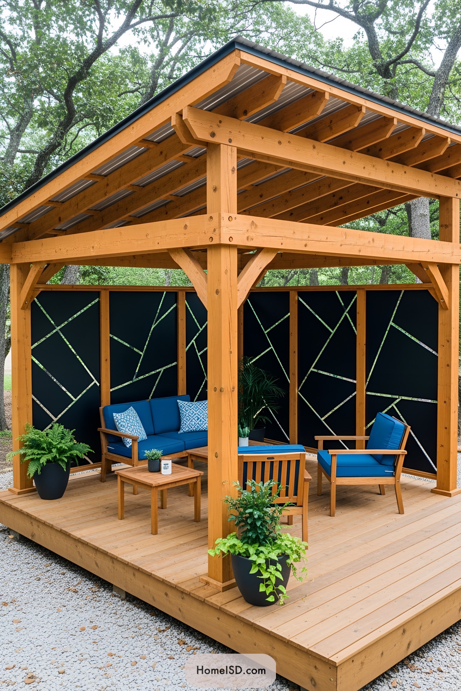 Cozy pergola with blue seating and black panel backdrops