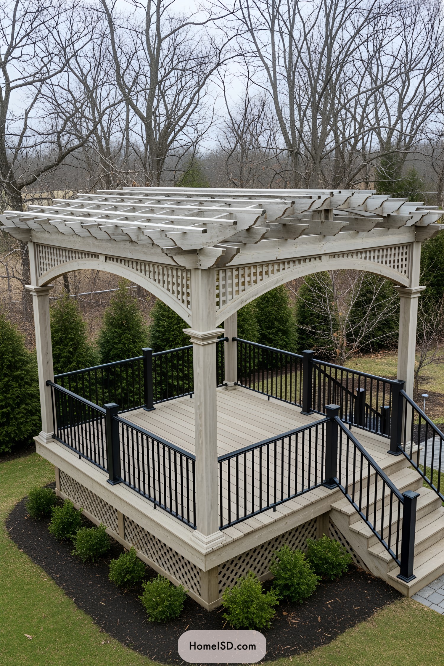 Elevated wooden deck with pergola and black railings